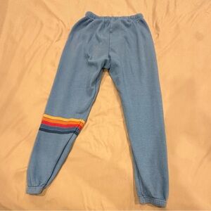 Aviator Nation Blue Track Pants with Rainbow Stripe
